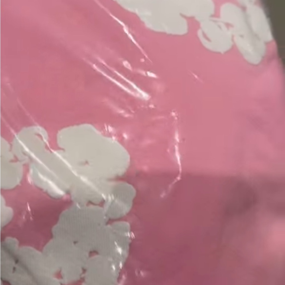 Pink denim tears